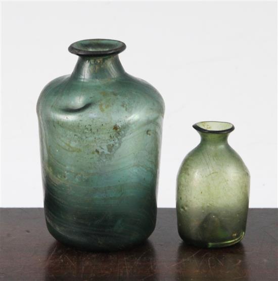 Two Roman glass bottles, c.2nd-4th century AD, 5.5 - 9.5cm